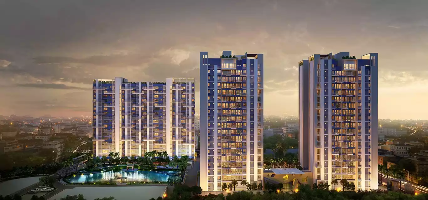 Morya residential towers and lagoon at dusk